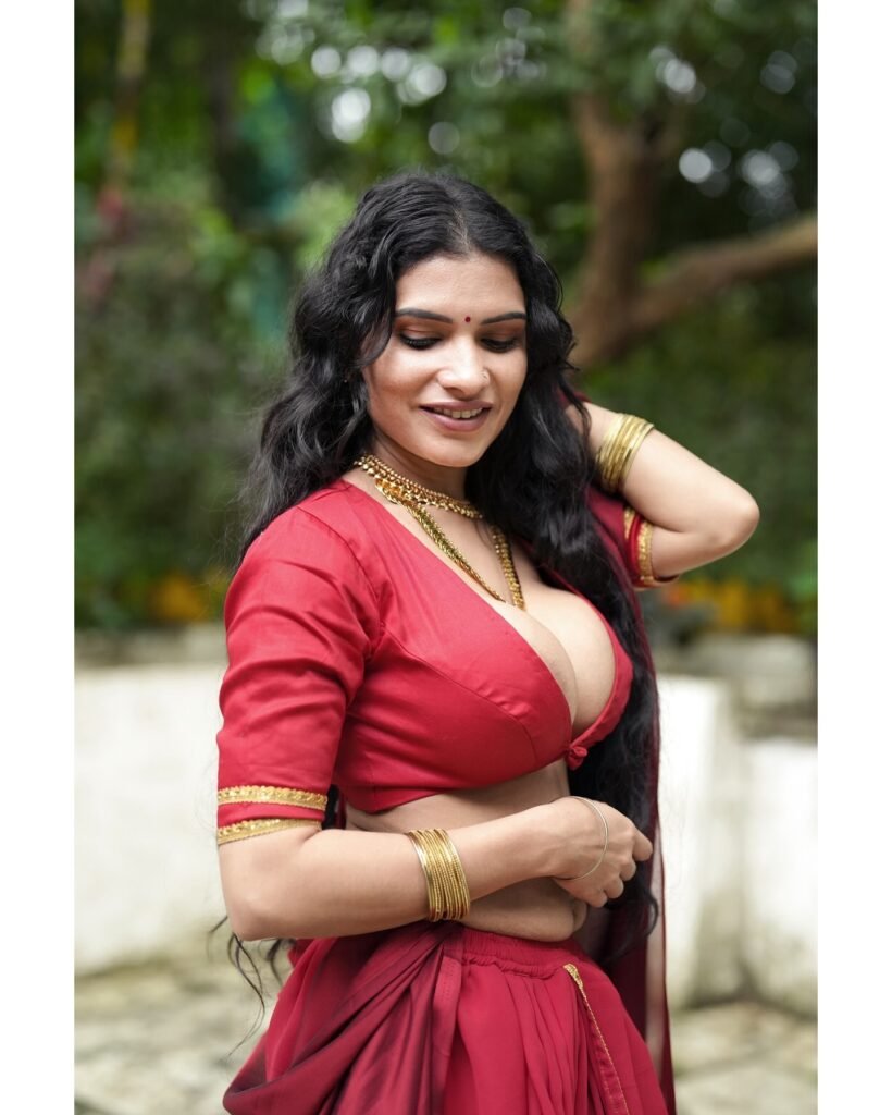 Resmi Nair sexy Pics